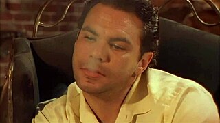 April flashes her big tits and shaved pussy before milf fingering frenzy