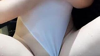 beautiful chinese babe with big tits relaxes at home