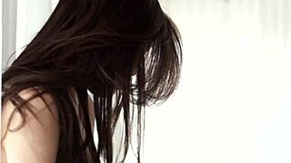 A glamorous model teases her desires with intimate solo fingering.