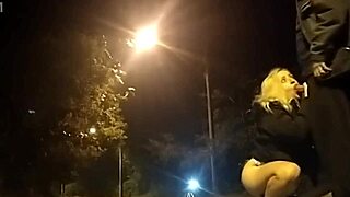 blonde slut drops to knees for street blowjob as police watch nearby
