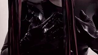 Ebony Shemale Strokes Monster Cock in Shiny Latex