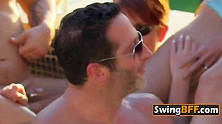 bisexual swingers kiss passionately before diving into steamy group orgy