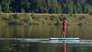 sup girl flashing pink micro bikini outdoors