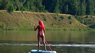 sup girl flashing pink micro bikini outdoors