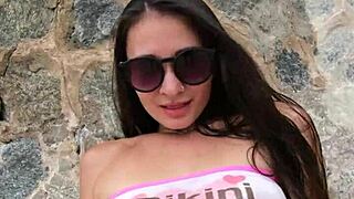 wanna see this cute bikini babe flash at the beach?