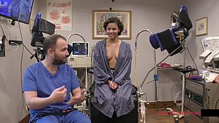 rebel wyatt spreads her pierced nipples and shaved pussy wide at tampa uni physical backstage