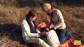 brunette lesbians strap on fuck during outdoor hike