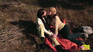 brunette lesbians strap on fuck during outdoor hike