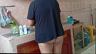 Chubby curvy madrastra cleans kitchen while fingering fat pussy