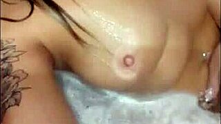 Pretty blonde babe masturbates in hot tub then takes loud cumshot