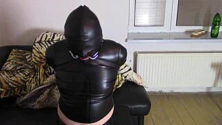 DROOLING KATJA BOUND TIGHT IN LEATHER CROSSDRESSER BONDAGE