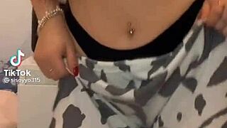 Crossdresser dances showing see-through banana panties