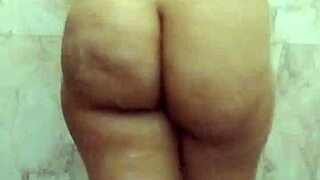 desi girlfriend fingers big tits in bathroom?