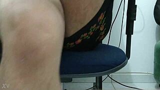 he crosses his legs in sexy panties, teasing viewers to comment for more crossdressing clips