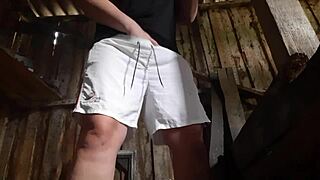 Village girl fingers pussy in barn fully clothed