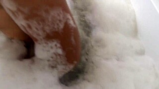 maxine x squirts massive on nadia white's face during big clit lesbian sex in jacuzzi bath.