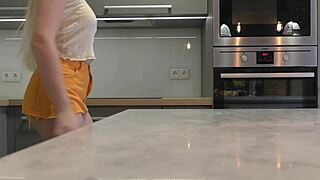 omg long-legged blonde coed in miniskirt heels flashes ass n pussy in kitchen uh wait her panties...