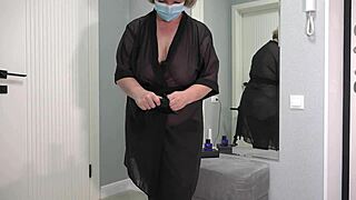 A Plump Milf Tries Sexy Bodysuit Revealing Big Ass Boobs and Saggy Tits in Mirror