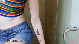 tall brunette model strips down and takes a steamy shower for the camera