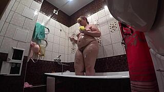 Hidden Cam Spies Curvy Model's Bathroom Moments