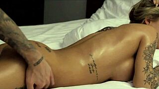 hey, divine sinners blonde tattoo milf gets oiled up for slow kissing and pussy licking with inked damon