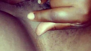 chubby black babe spreads shaved pussy lips closeup for first solo fingering