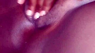 chubby black babe spreads shaved pussy lips closeup for first solo fingering