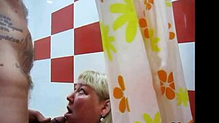 FAT BUSTY BLONDE GETS PEE ON FACE IN BATHROOM QUICKIE!