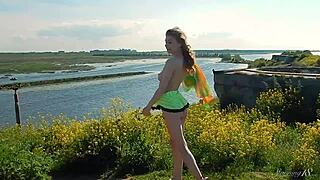 spunky 18+ blonde teen model strips miniskirt outdoors revealing horny pussy