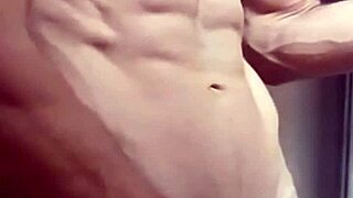 Watch this muscular bodybuilder strip naked as clothes rip off his sexy frame!