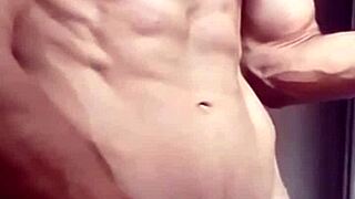 Watch this muscular bodybuilder strip naked as clothes rip off his sexy frame!