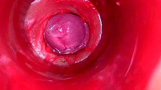 Camera films powerful cum flooding oiled pussy internals