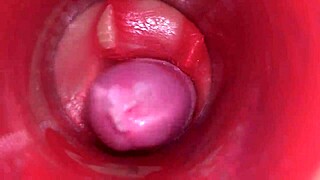 Camera films powerful cum flooding oiled pussy internals