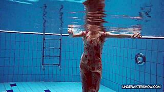 martina's croatian redhead bikini teases escalate to steamy public pool nudist shower