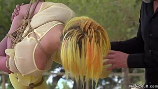 damn this hottie bound in yellow tights flashes her kinky outdoor bdsm submission