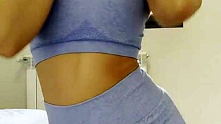 dirty blonde slut in tight leggings dances with wet pussy flashing her small tits during orgasmic solo masturbation