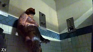 Prison dude jerks massive tattooed cock to wet solo cum