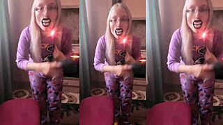Blonde with glasses brushes long hair using lollipop in asmr