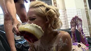 Picture two busty brunettes smearing food over tits and asses while kissing passionately