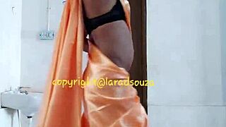 i'm slutty lara dsouza crossdressing sexy in orange saree