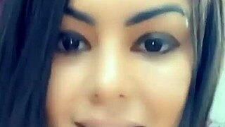 Queen Bee Brunette Records Tanned Curves in Sexy Lingerie Videos