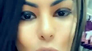 Queen Bee Brunette Records Tanned Curves in Sexy Lingerie Videos