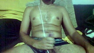 Brazilian amateur jerks huge cock in bedroom with heavy dirty talk instructions