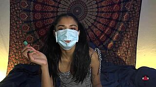 Mask off, she dives deep on patient's throbbing cock.