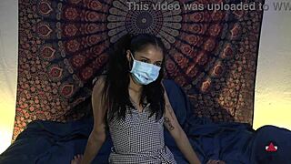 Mask off, she dives deep on patient's throbbing cock.
