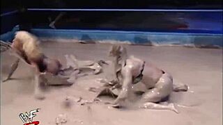 WWF Ivory Dominates Miss Kitty in Steamy Mud Wrestling Clash