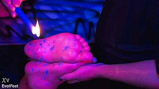 candle wax teases your bound feet gently