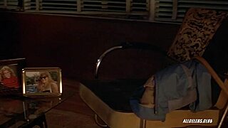 Janet Gunn bares huge tits strokes cock in sexy topless handjob scene