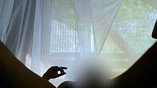 early morning couple strolls to cozy forest cabin for intimate nature walk