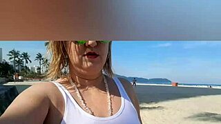 sunlit beach curves hint at mature blonde's hidden depths